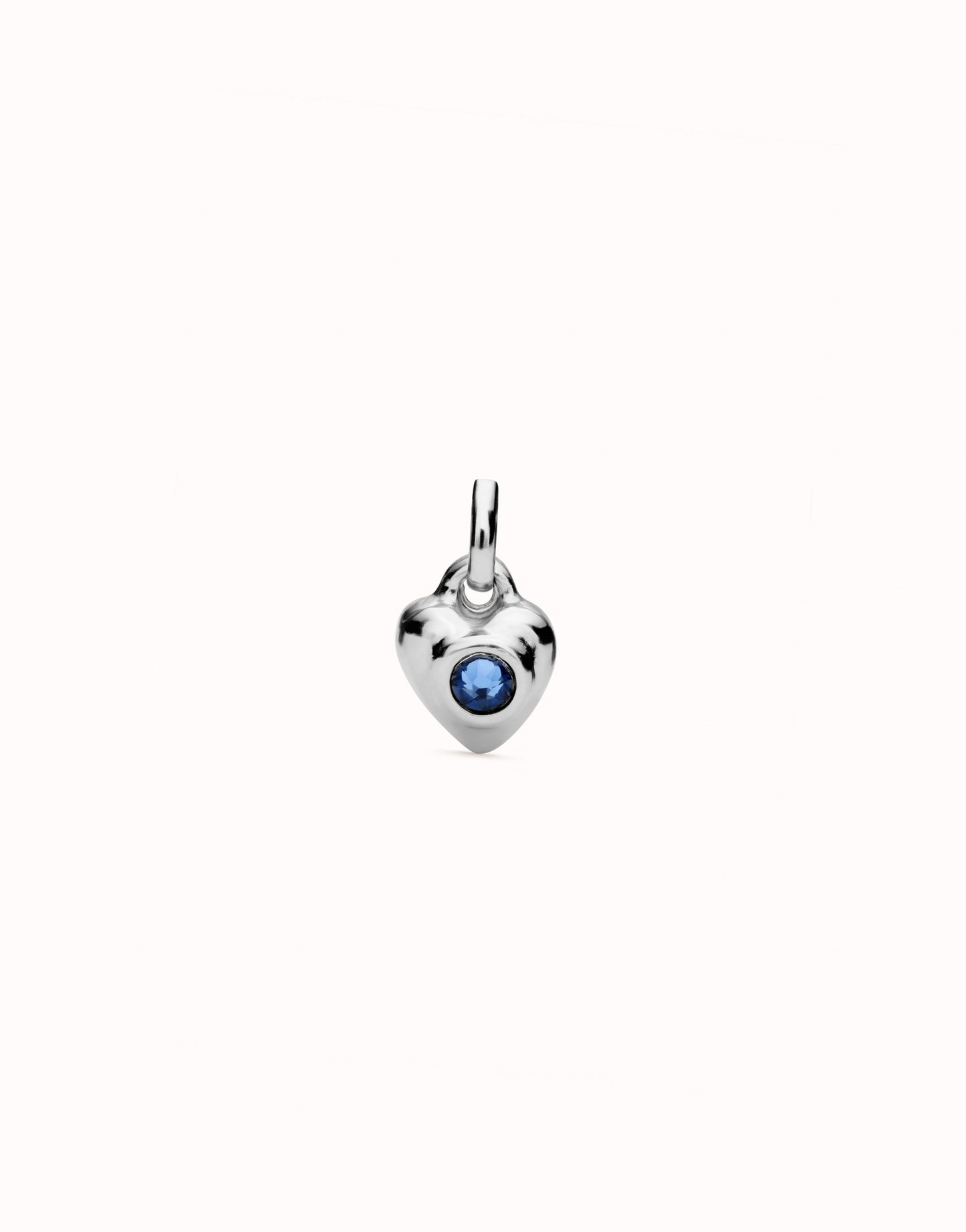 UNO DE 50 - Charm bañado en plata de ley con cristal azul.