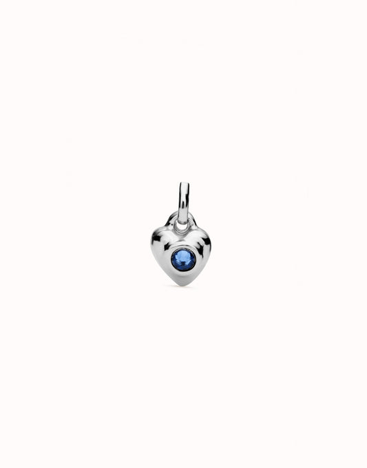 UNO DE 50 - Charm bañado en plata de ley con cristal azul.