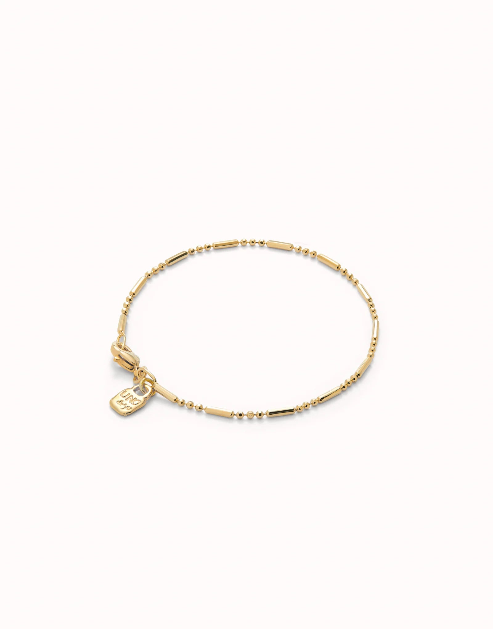 Uno de 50 18K gold-plated bracelet with beads and elongated piece•