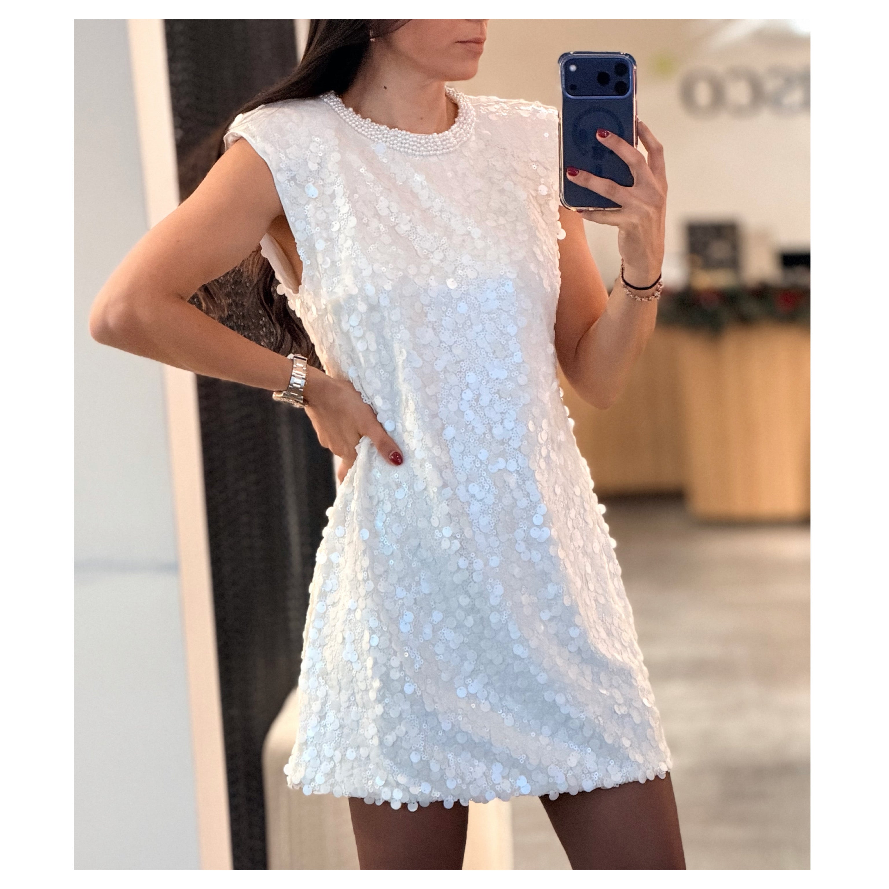 Sequin Sleeveless Pearl
Beaded Neckline Mini Dress•