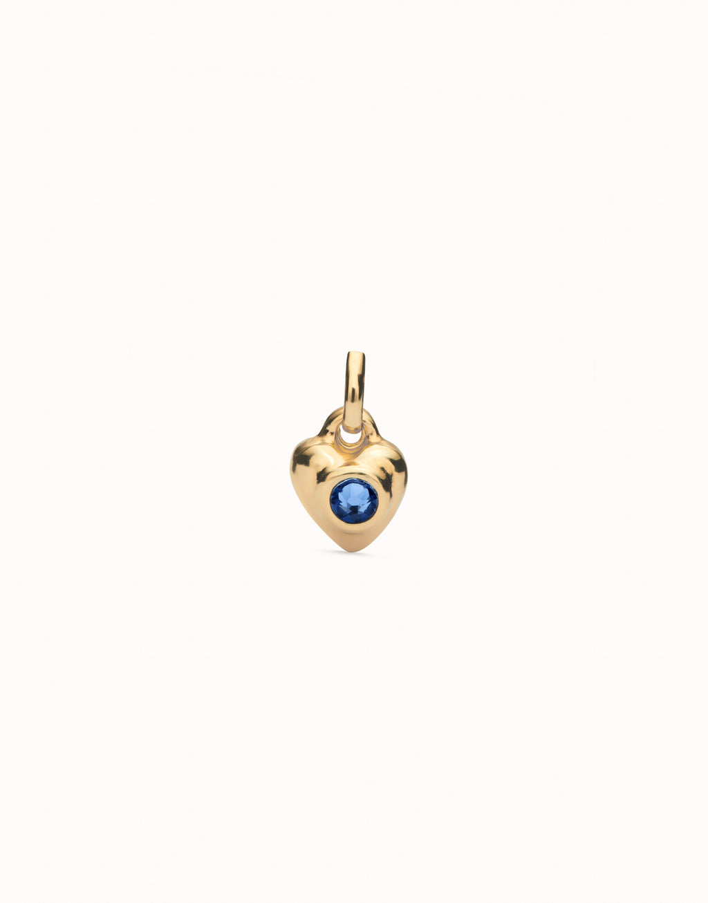 UNO DE 50 - Charm bañado en oro 18k con cristal azul.