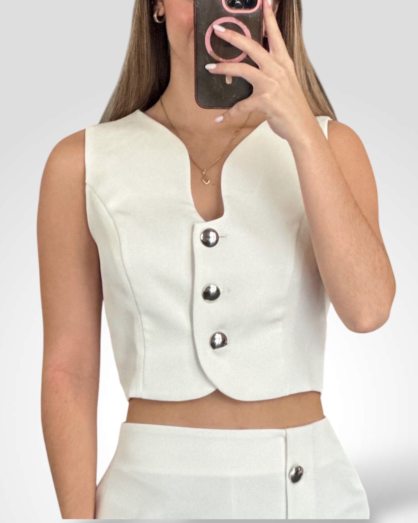 SLEEVELESS CREPE PUZZLE VEST WITH SHINY SILVER BUTTONS