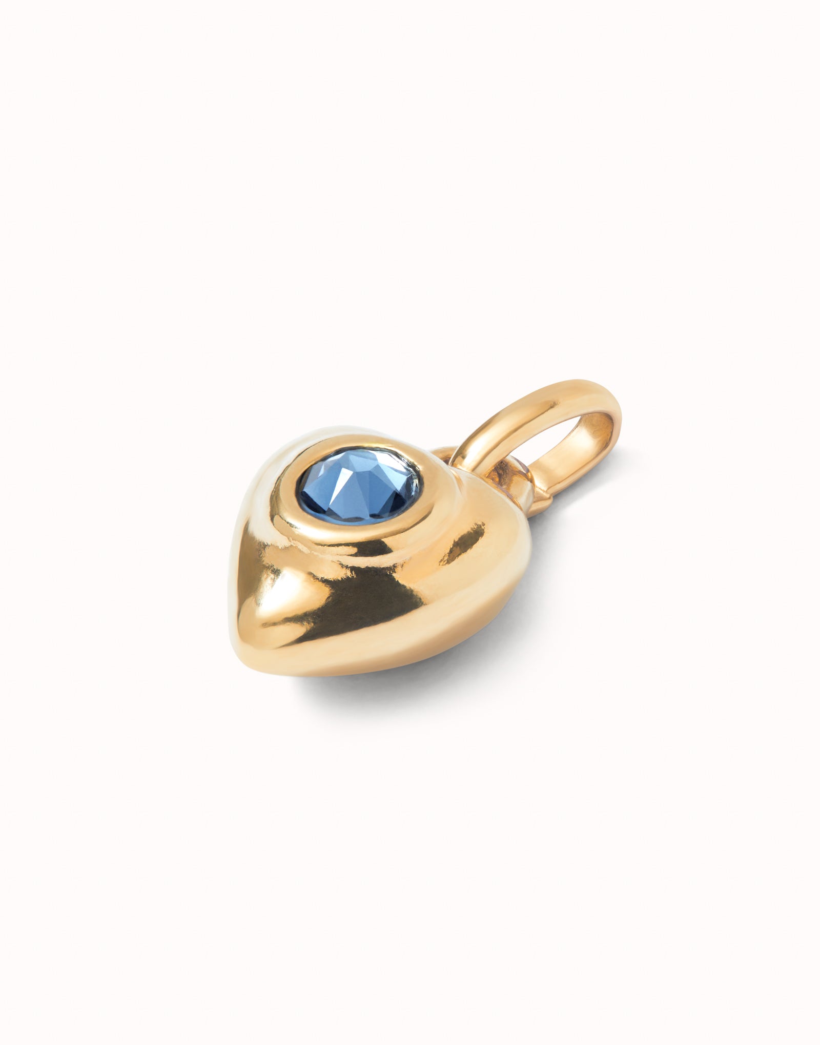 UNO DE 50 - Charm bañado en oro 18k con cristal azul.