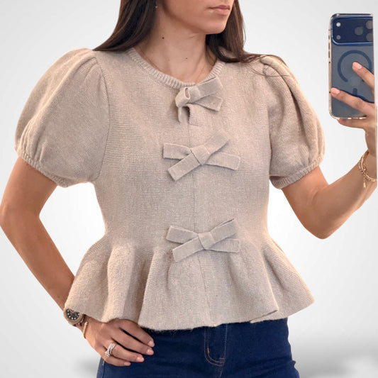 PEPLUM KNIT TOP WITH BOW DETAIL