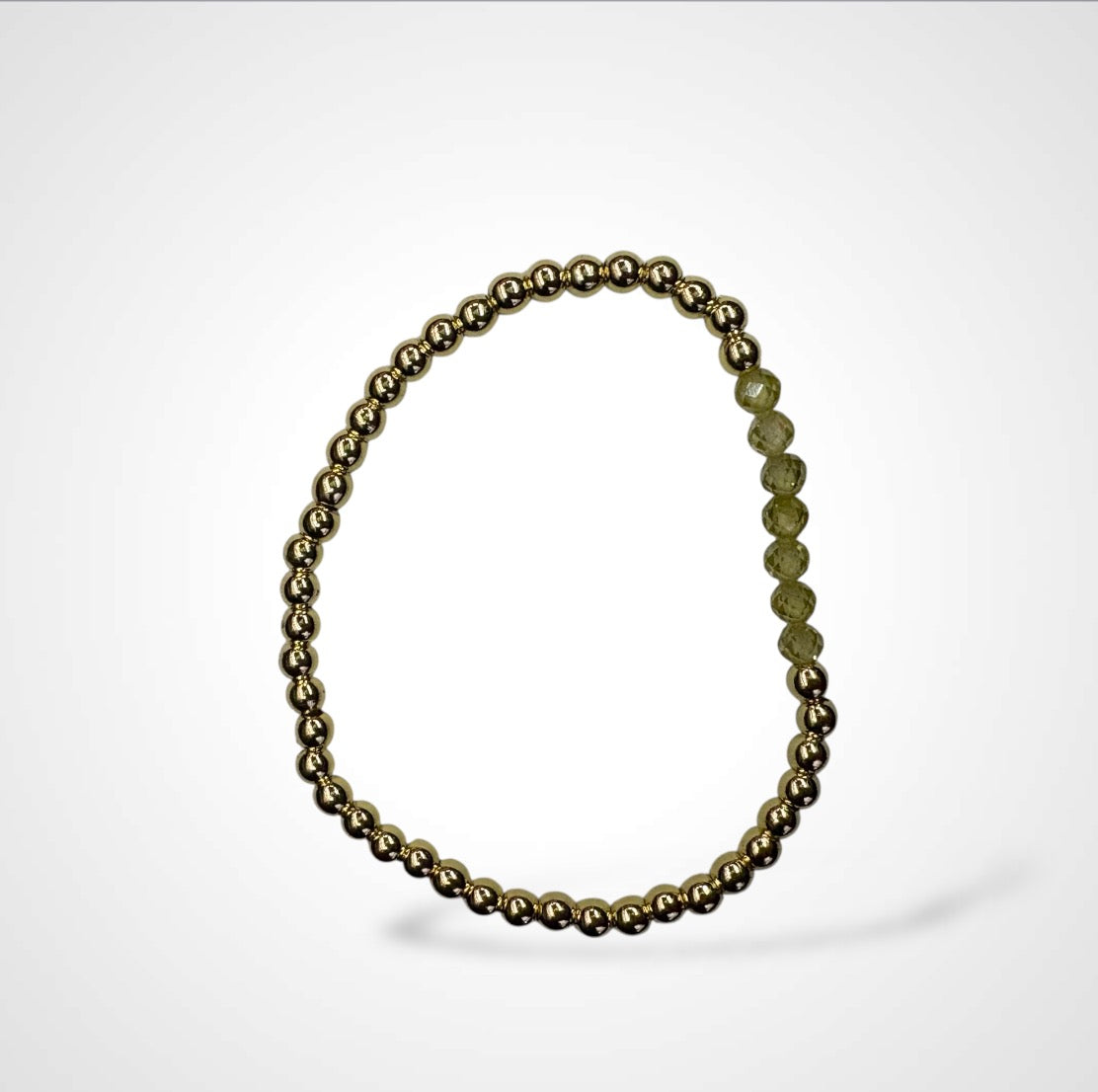 ARIA'S GOLD BRACELET W OLIVE CRYSTALS