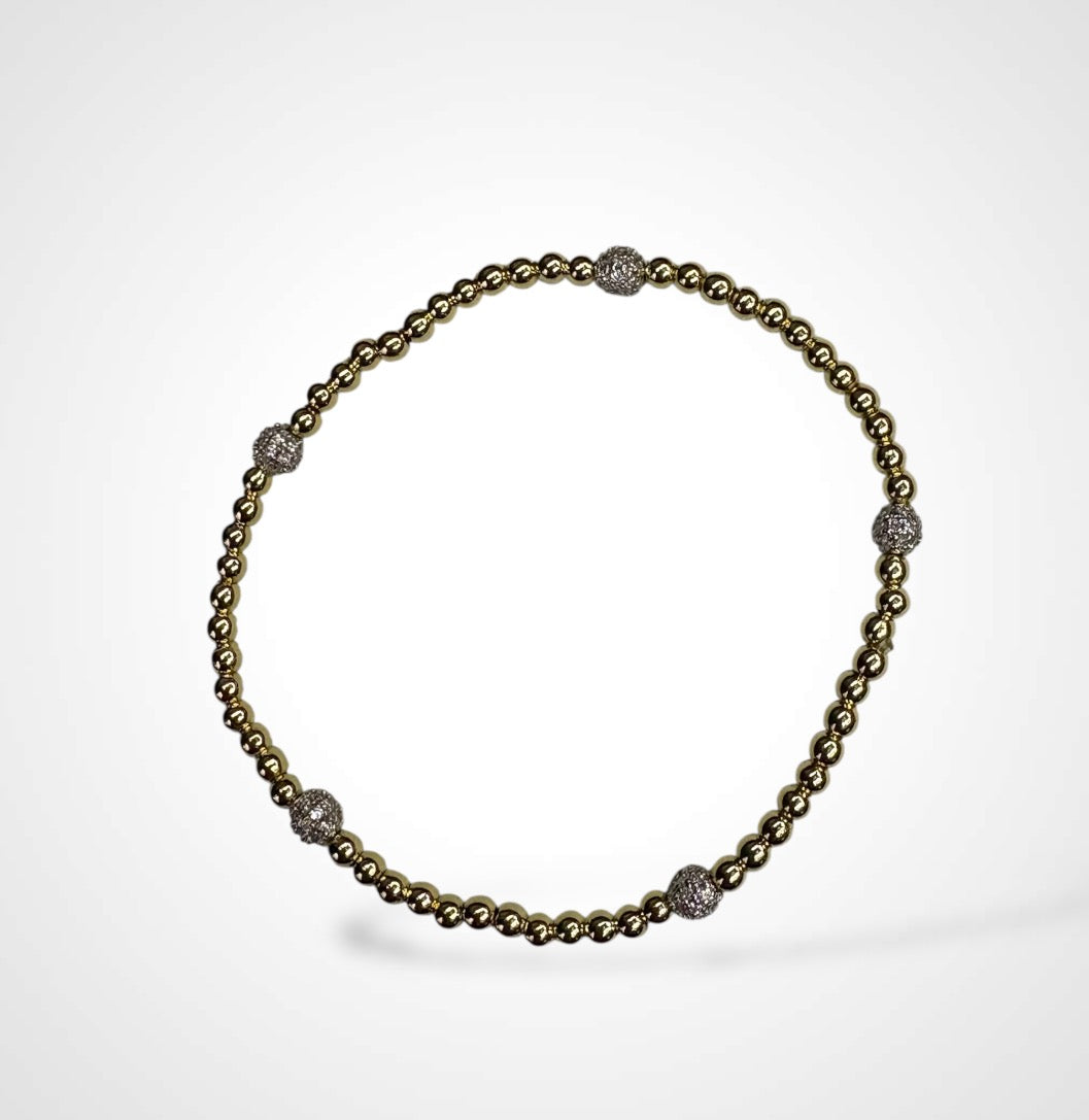 ARIA'S GOLD BRACELET W SILVER BALLS DETAILS