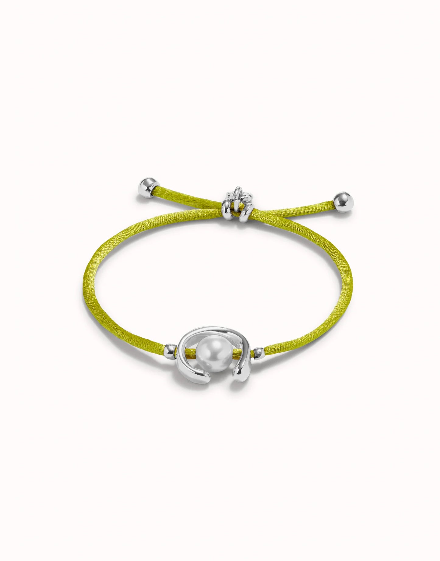 UNO DE 50 - Pulsera de hilo lima con perla shell fornitura bañada en plata de ley.