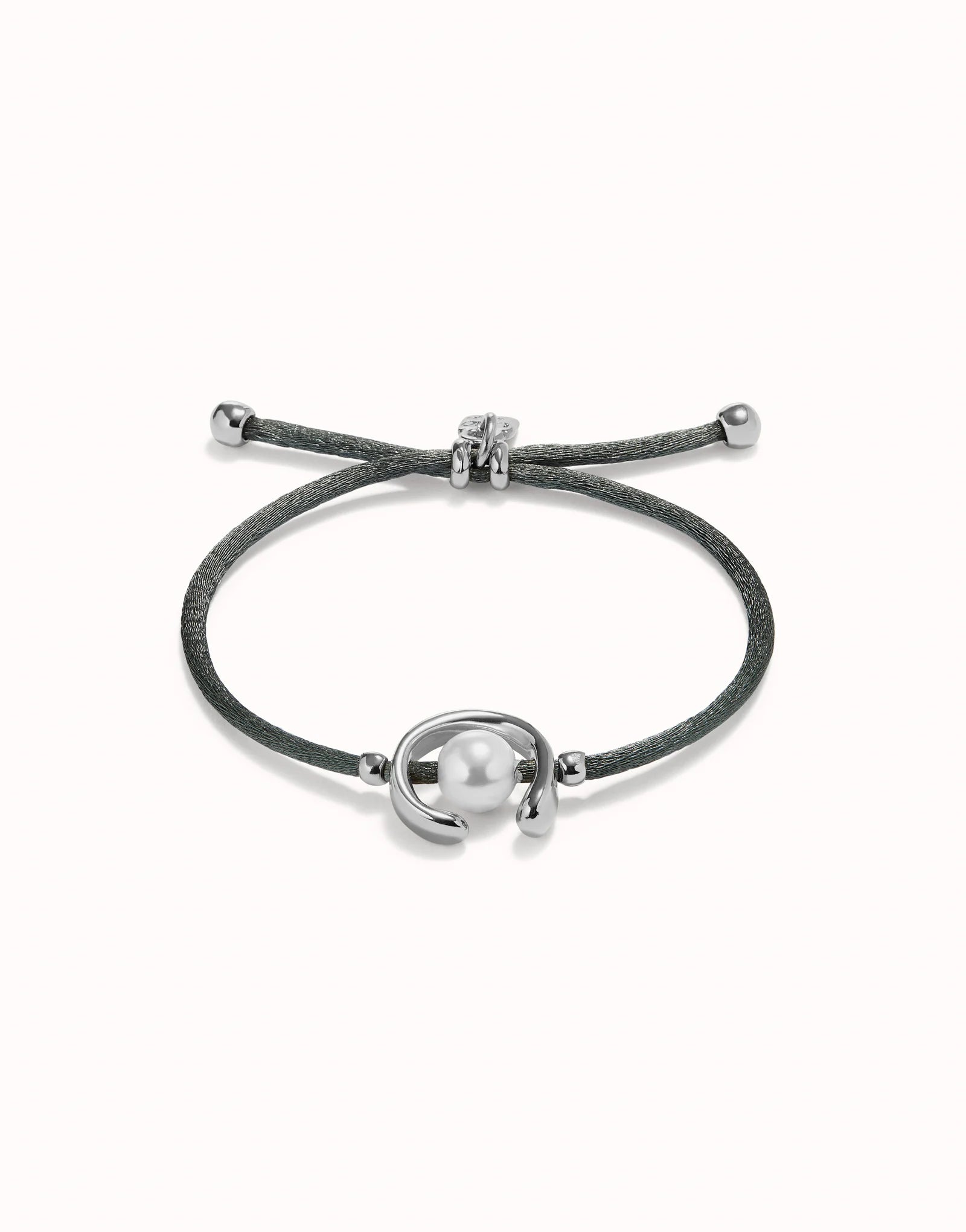 UNO DE 50 - Pulsera de hilo negroso con perla shell fornitura bañada en plata de ley.