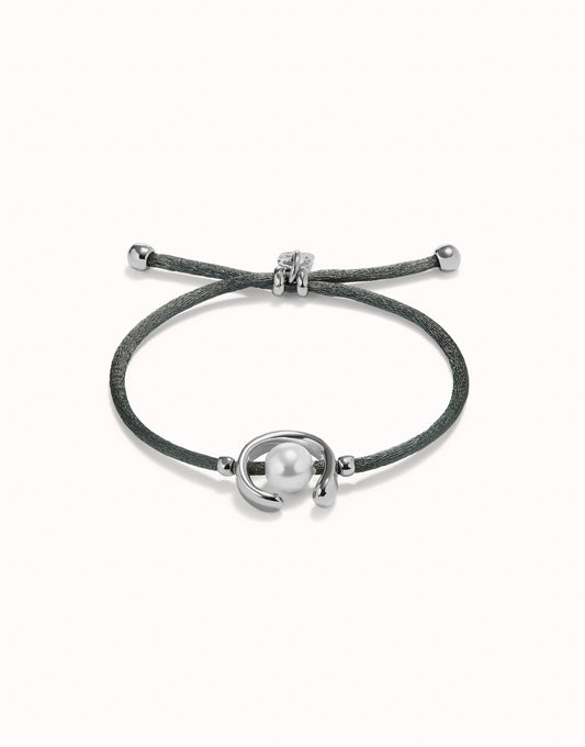 UNO DE 50 - Pulsera de hilo negroso con perla shell fornitura bañada en plata de ley.