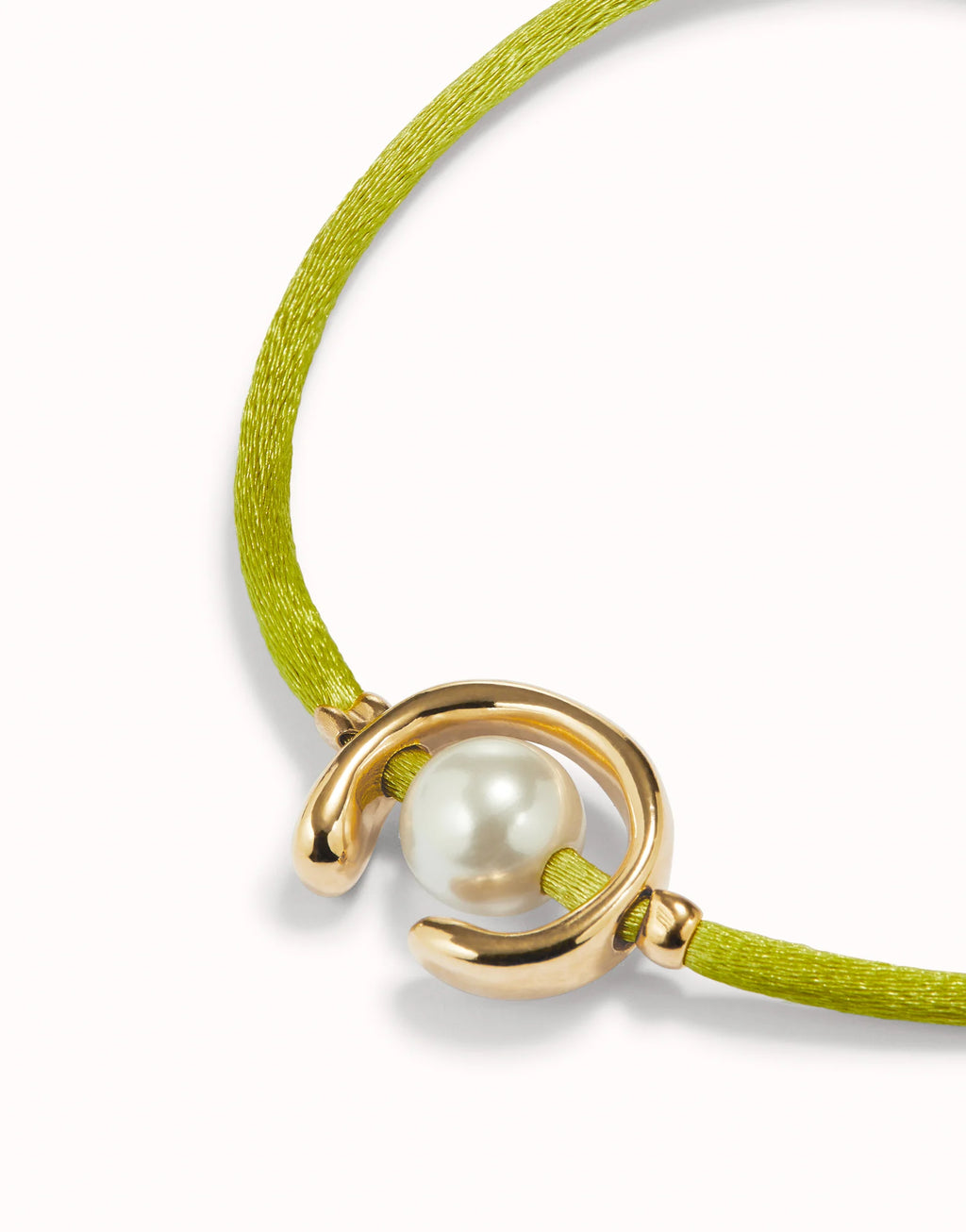 UNO DE 50 - Pulsera de hilo lima con perla shell fornitura bañada en oro 18k.