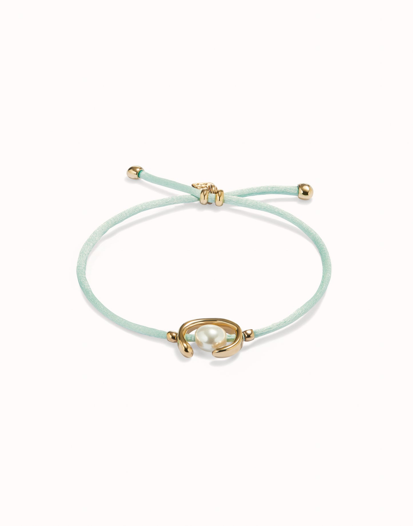 UNO DE 50 - Pulsera de hilo verde azulado con perla shell fornitura bañada en oro 18k.