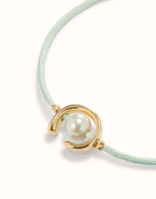 UNO DE 50 - Pulsera de hilo verde azulado con perla shell fornitura bañada en oro 18k.