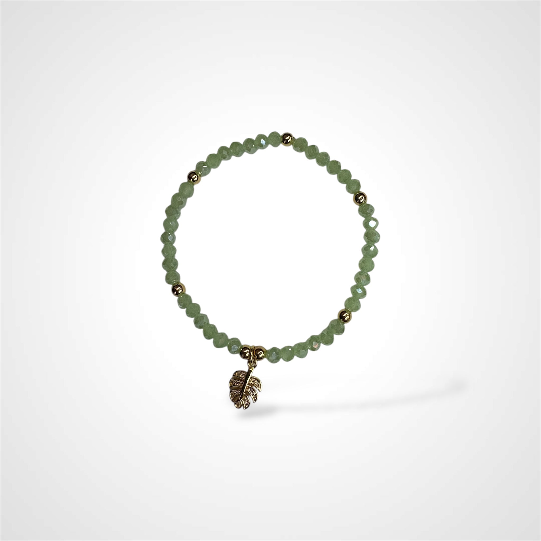 ARIA'S GREEN CRYSTALS BRACELET W GOLD LEAF10•